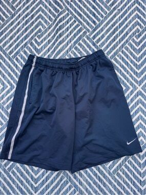 Nike Men's Navy Athletic Shorts with White Side Stripe and Swoosh